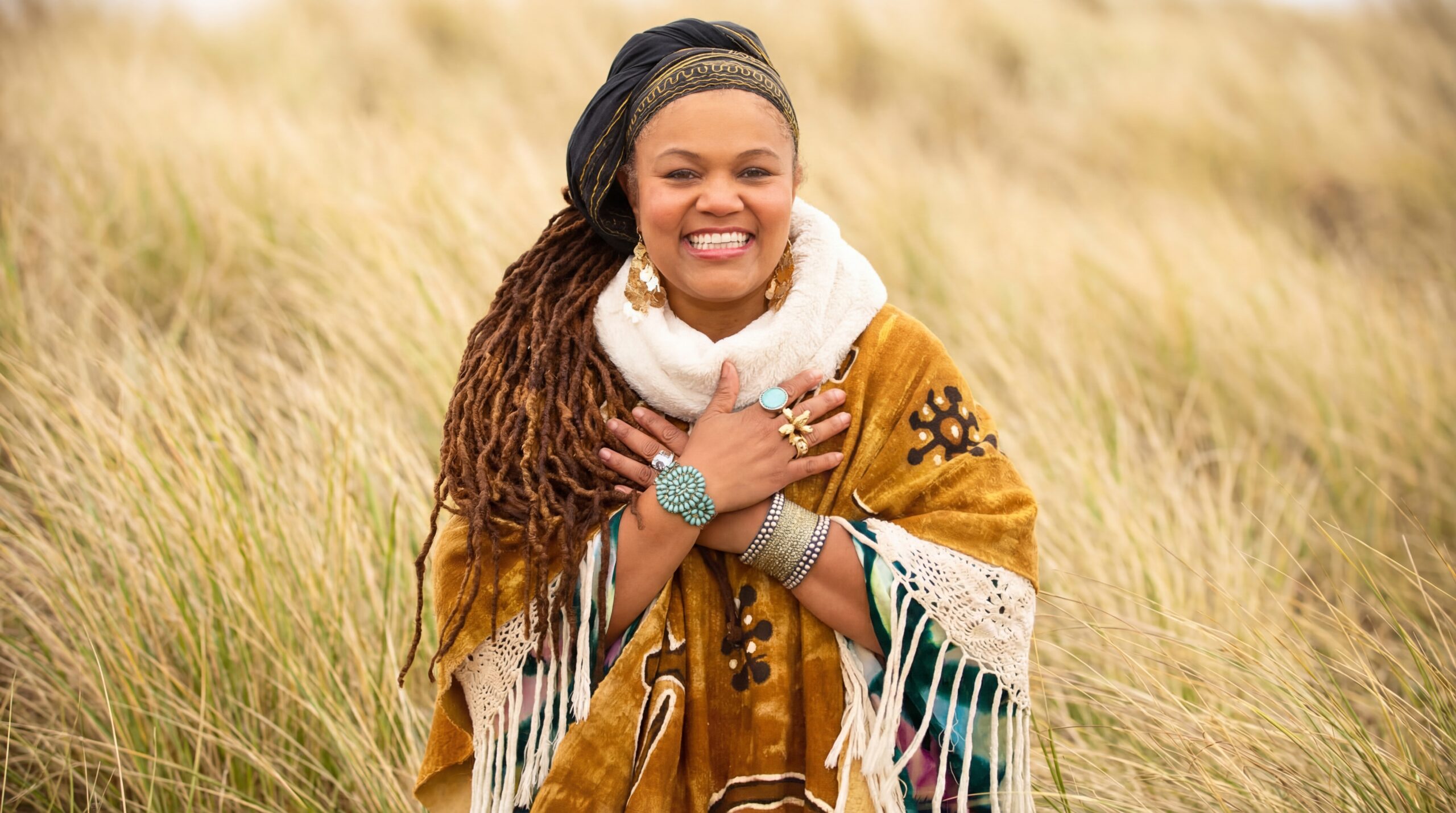 Amikaeyla Gaston with hands on heart